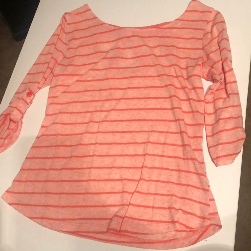 Pink striped shirt with quarter length sleeves and bow on back. Size medium